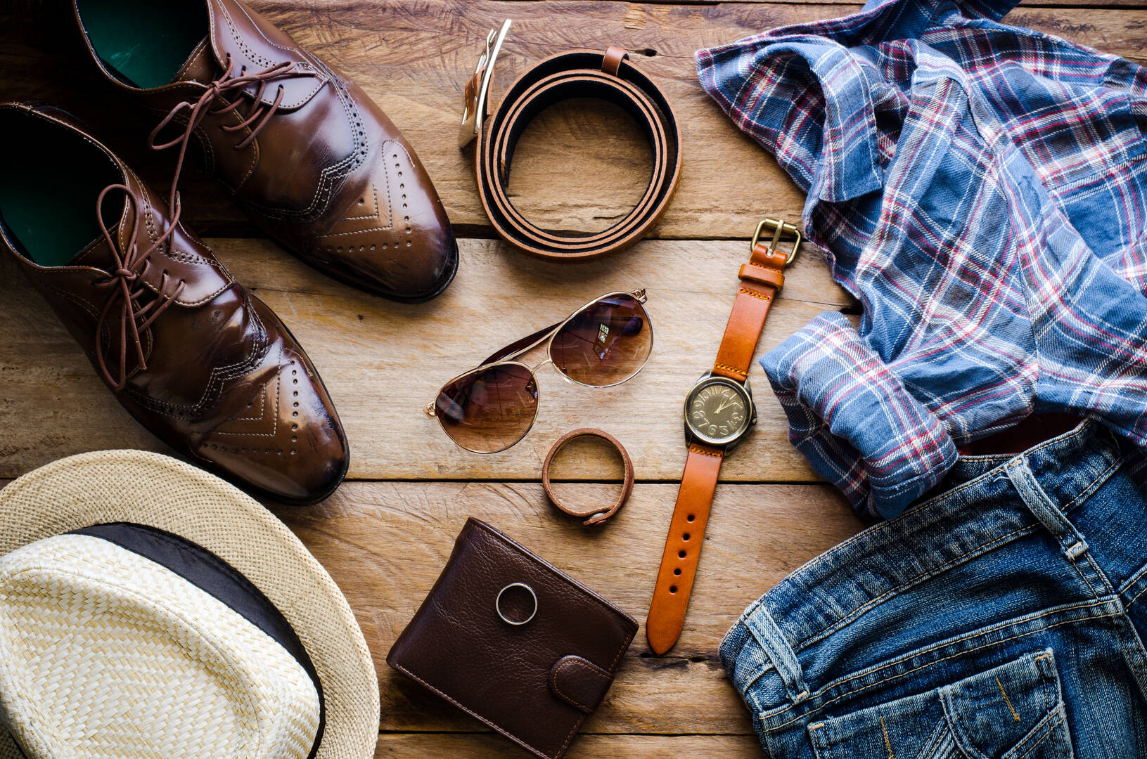 Ted's Clothiers logo